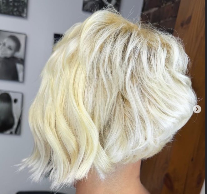 Modern textured chic blonde bob haircut by Root 6